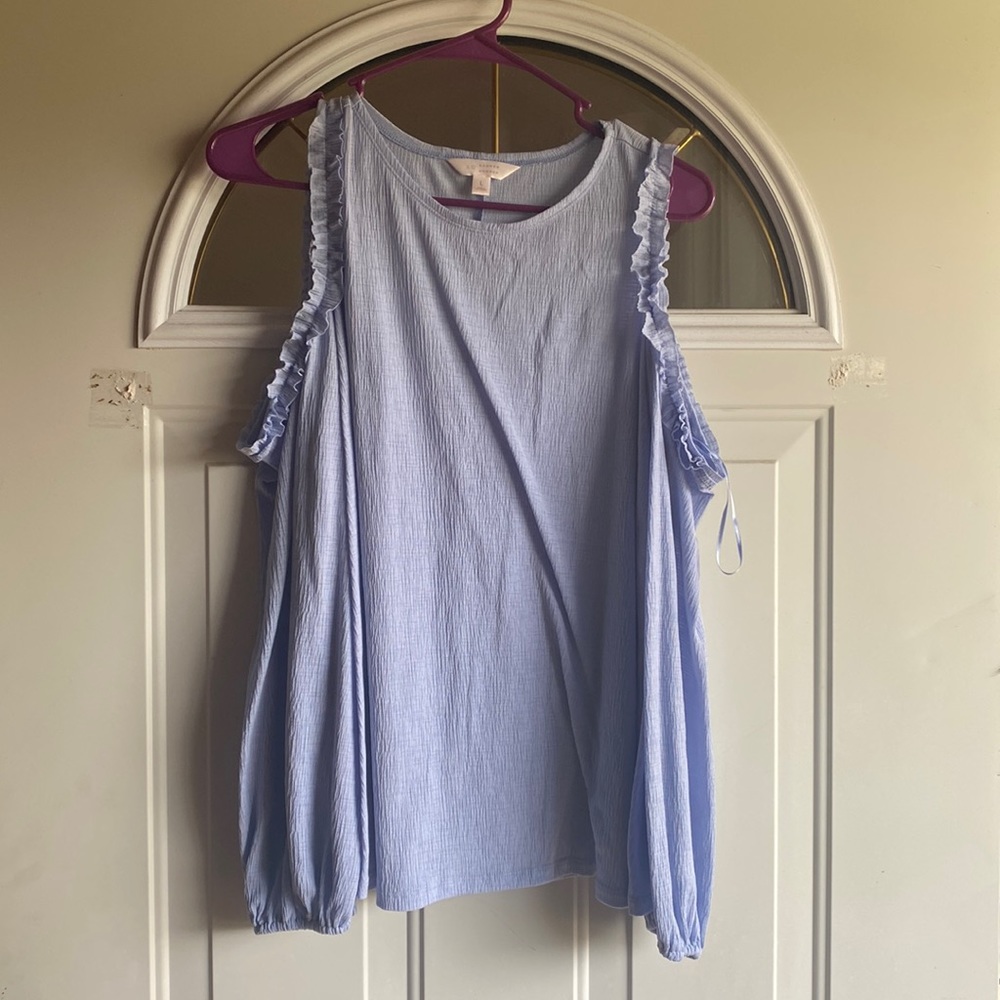 Beautiful cold shoulder top by Lauren Conrad. EUC barely worn. Size large.